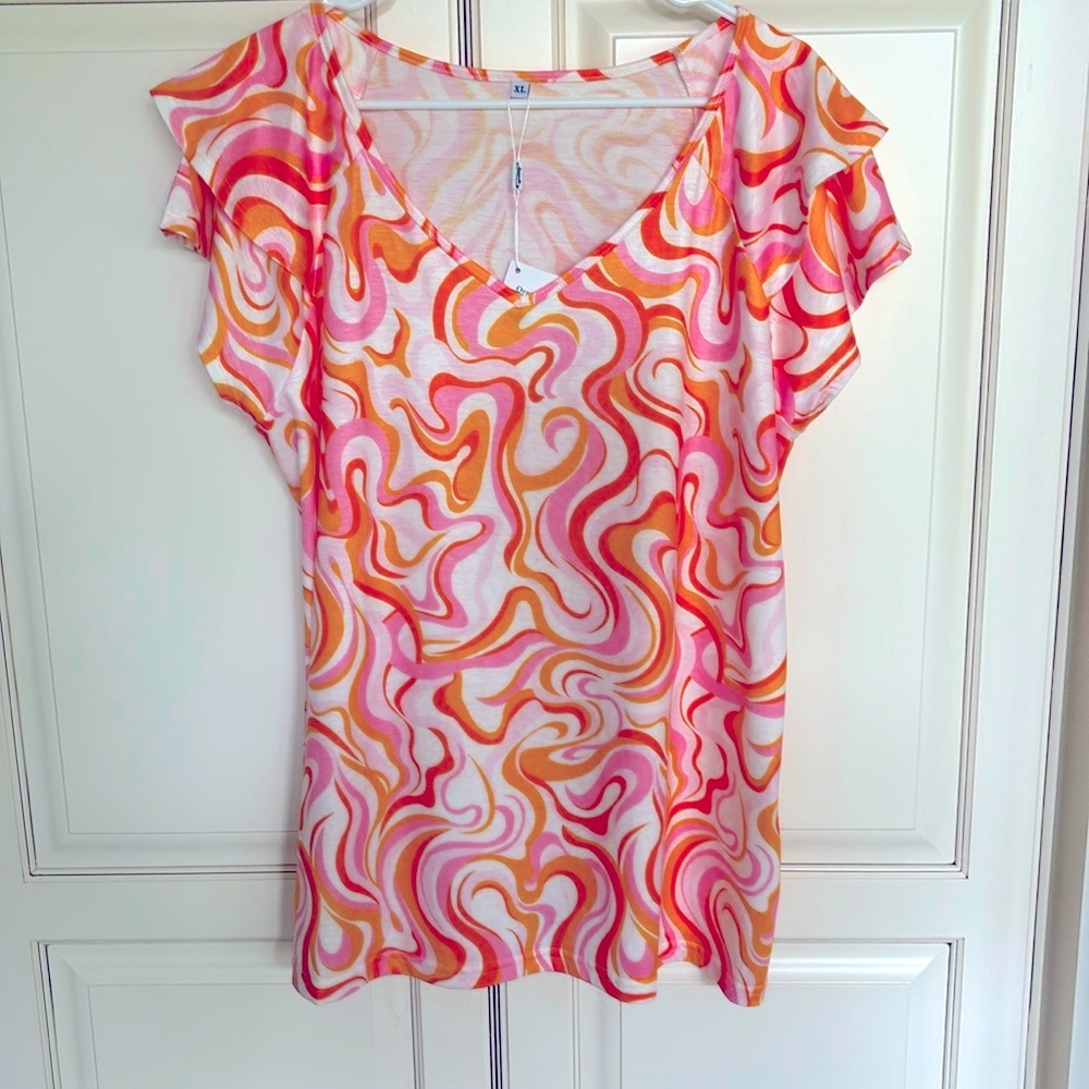 70s inspired, orange and pink swirly T-shirt. Ruffled sleeves, XL